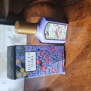 Gucci Flora 1oz New No refund  Authentic...comes  just like the picture.